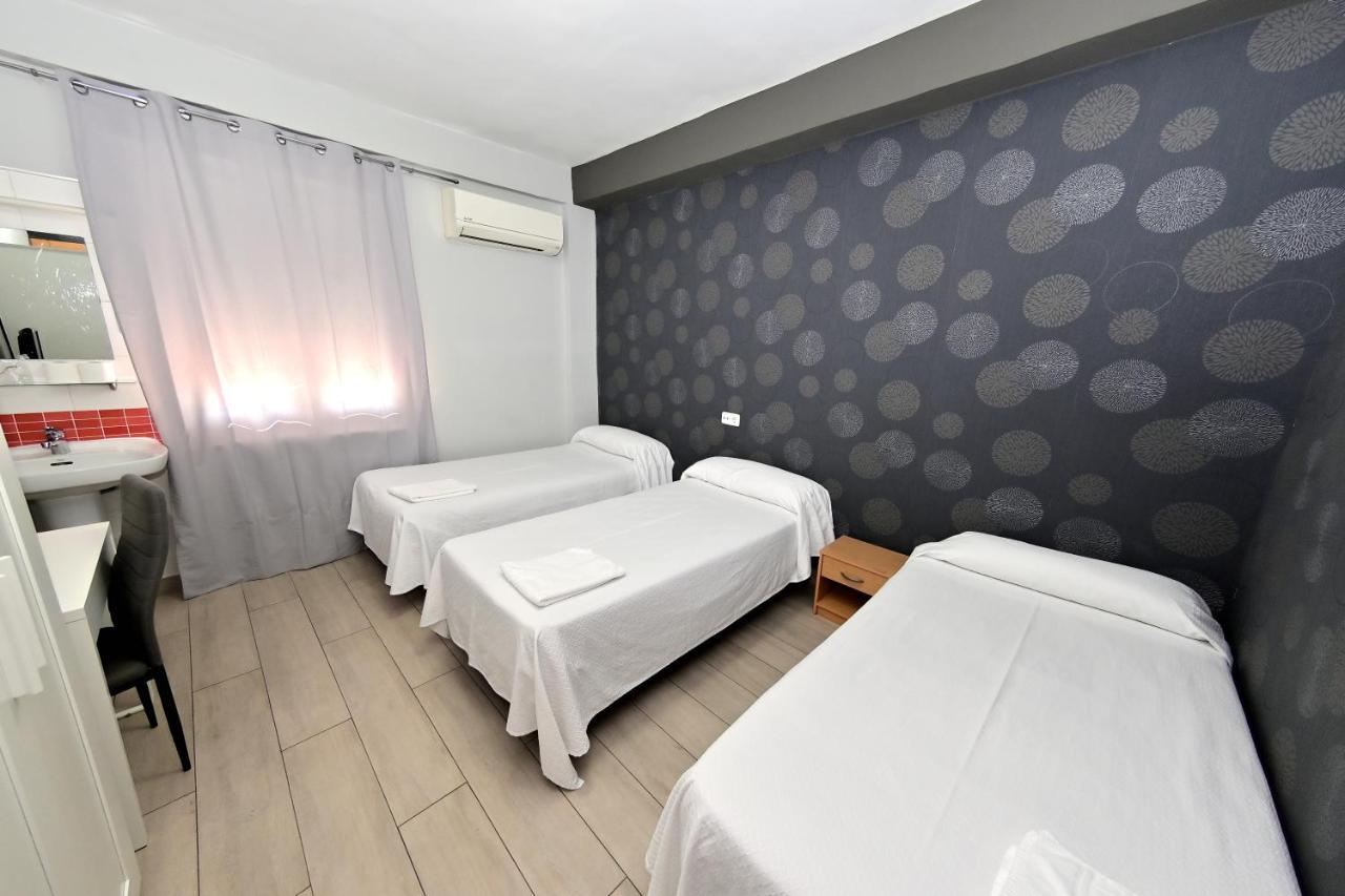 Double or Twin Room with Extra Bed and Shared Bathroom,1156868163:JPEG