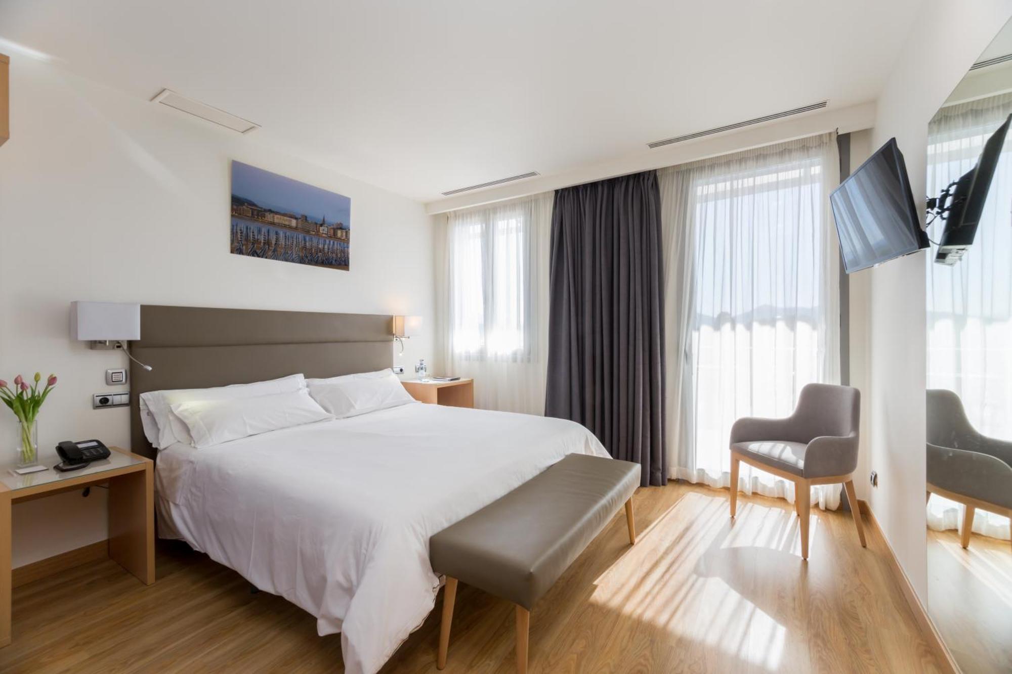 Chambre Lit Queen-Size Deluxe