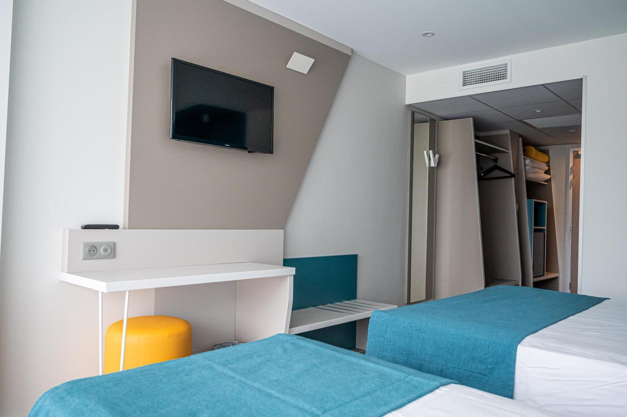 Chambre Triple avec Balcon