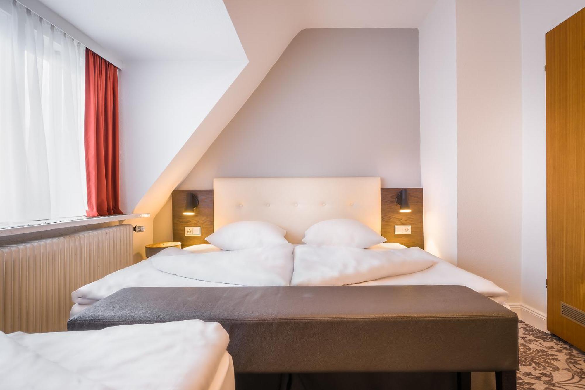 Dreibettzimmer