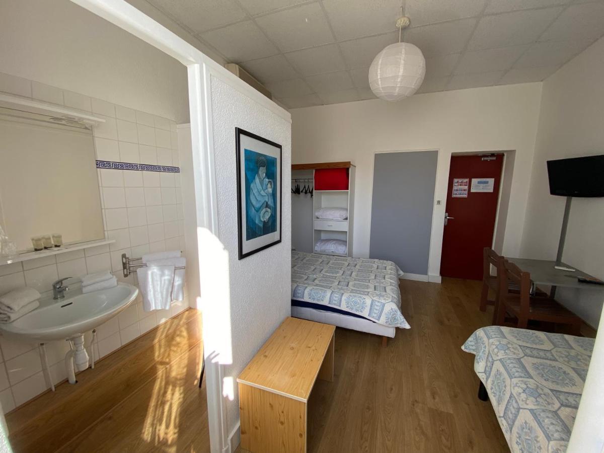 Chambre Triple avec Salle de Bains Extérieure