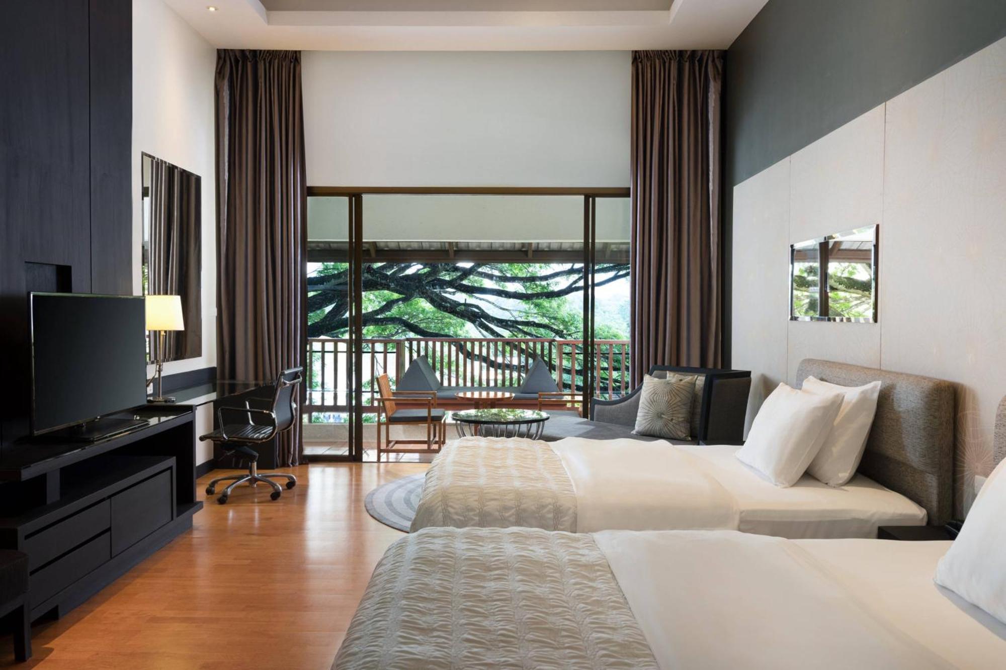 Deluxe Zimmer mit 2 Einzelbetten und Gartenblick