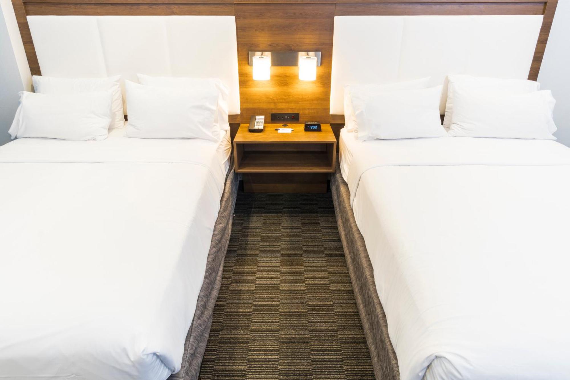Standaard Kamer met 2 Queensize Bedden