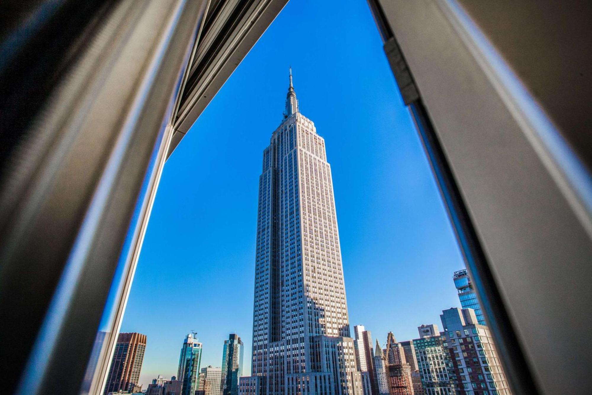 Quarto com Cama King-size e Vista da Cidade