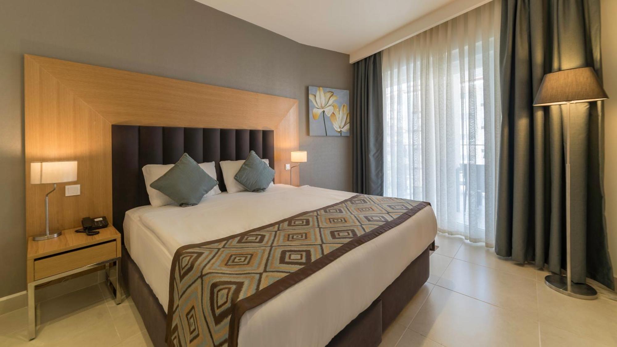 Suite met 1 Kingsize Bed en 2 Aparte Bedden