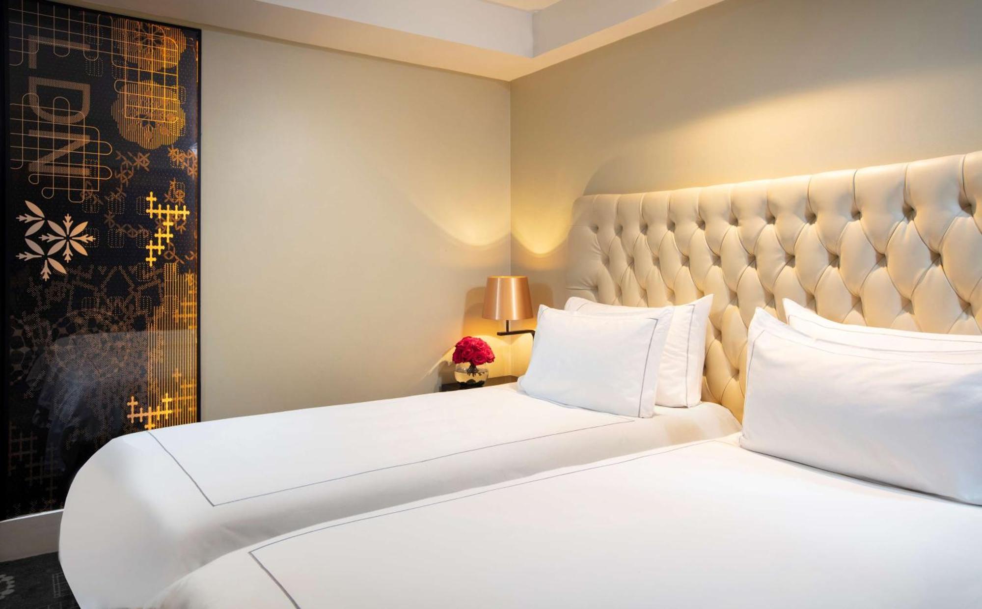 Deluxe Kamer met twee aparte bedden en slaapbank