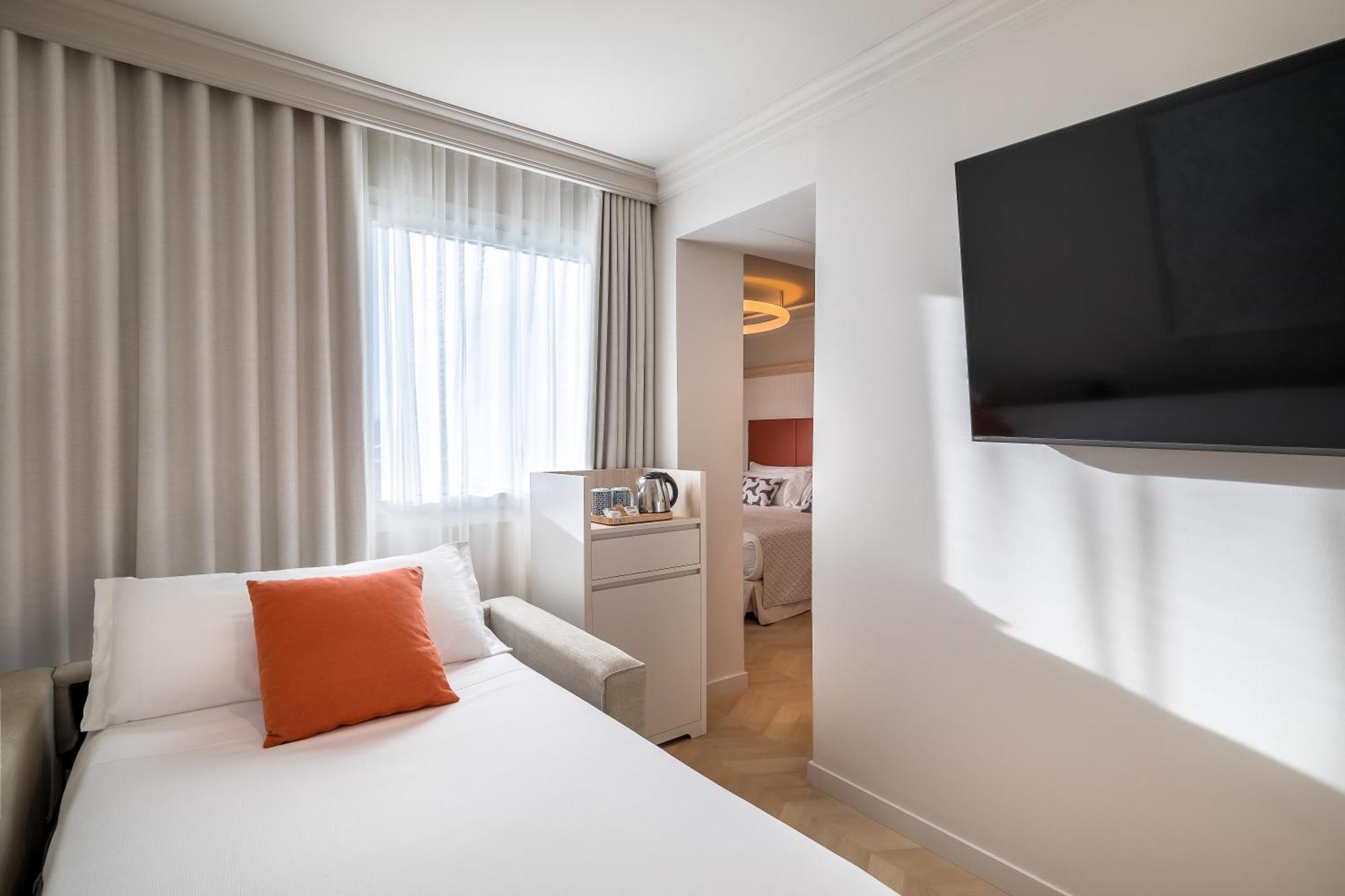 Quarto Triplo (2 Adultos + 1 Criança)