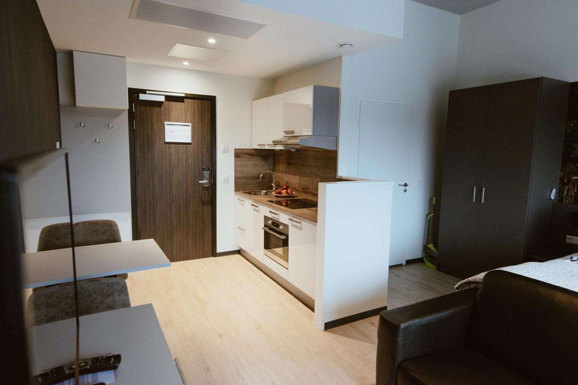 Luxe Studio met Uitzicht op de Stad