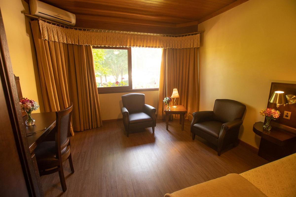 Quarto Deluxe com Cama de Casal ou 2 de Solteiro e Banheira de Hidromassagem