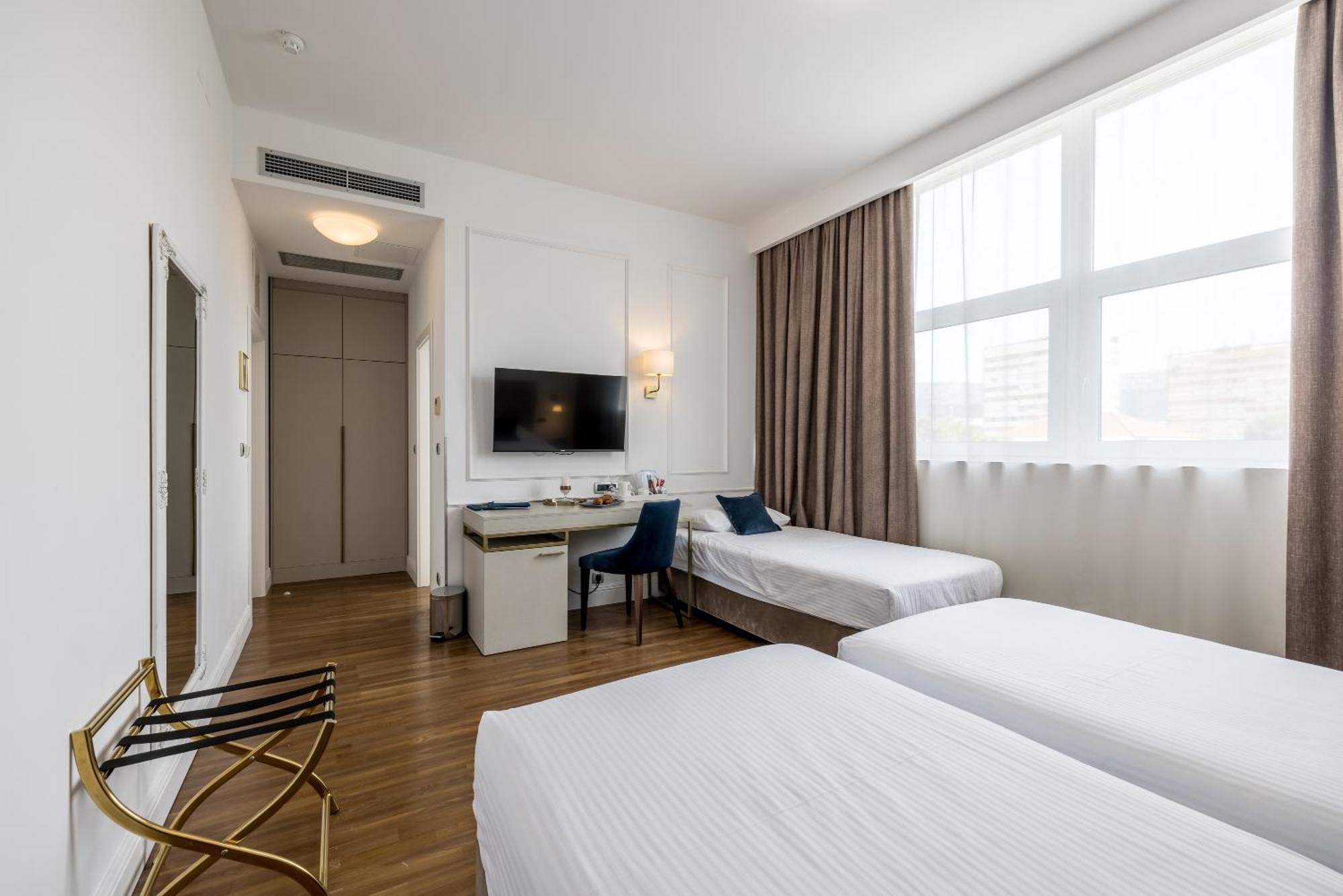 Dreibettzimmer
