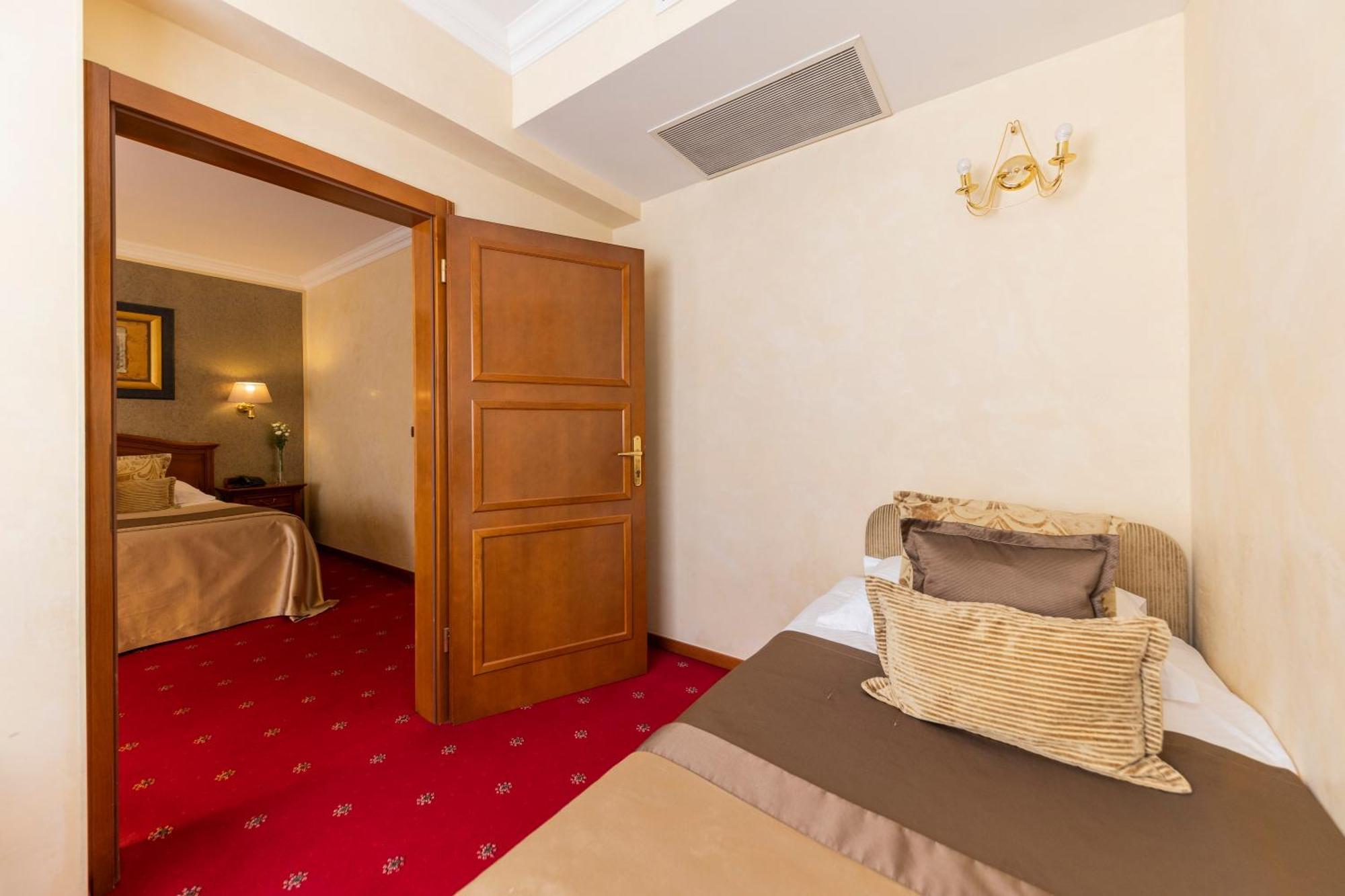 Dreibettzimmer mit Balkon