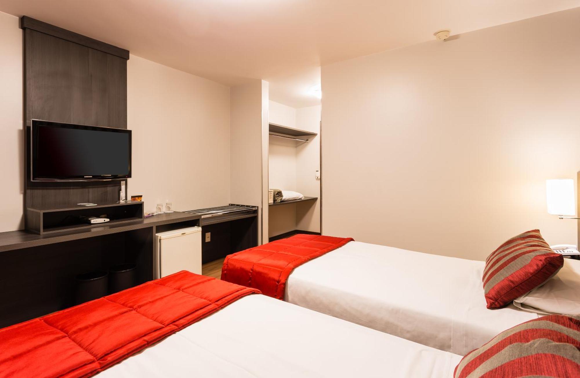 Quarto Executivo com 2 Camas de Solteiro