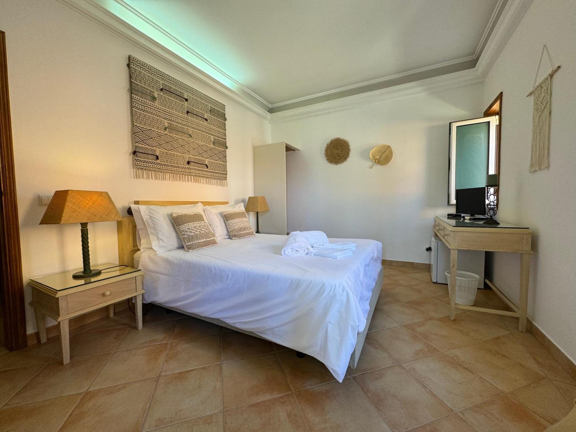 Doppelzimmer mit externem Gemeinschaftsbad und Balkon