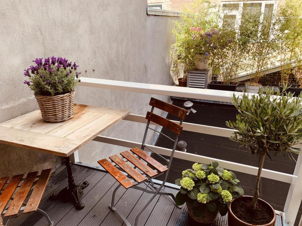 Kamer met balkon en eigen badkamer in de gemeenschappelijke hal.