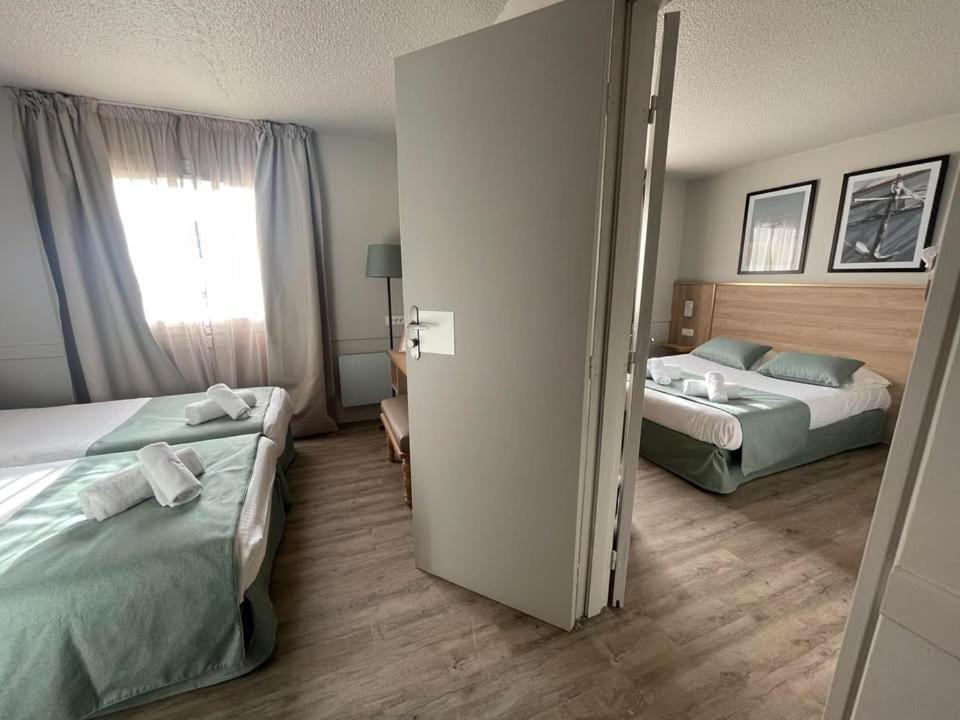 Deux Chambres Doubles communicantes (4 Adultes)