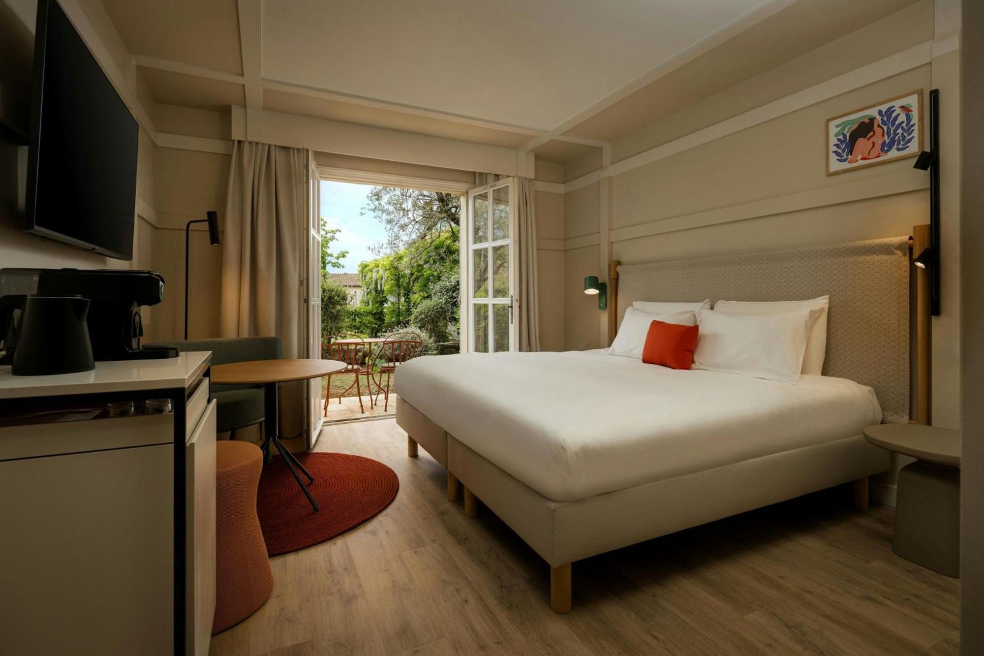 Chambre Double Deluxe avec Balcon - Vue sur Jardin