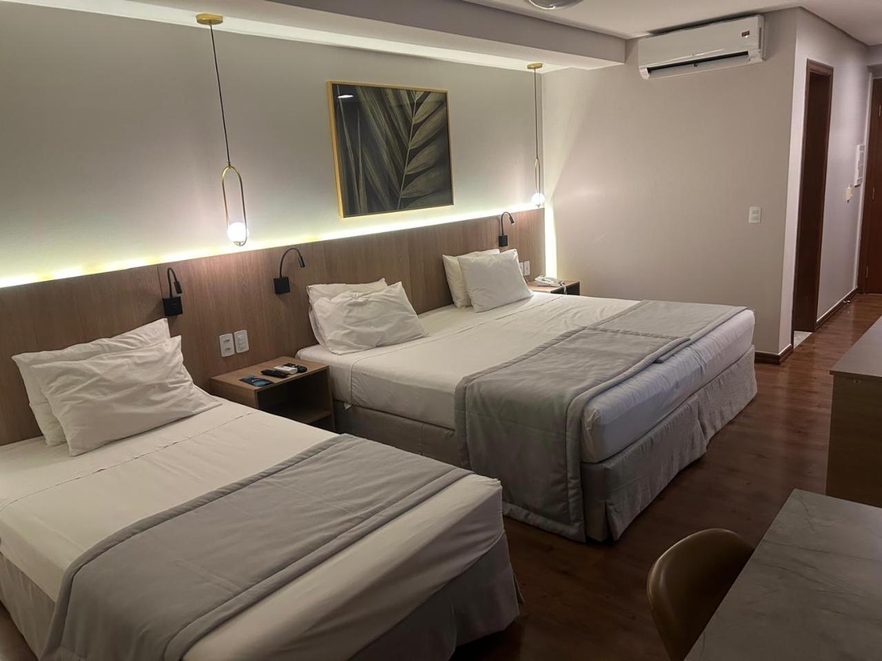 Quarto Triplo Executivo