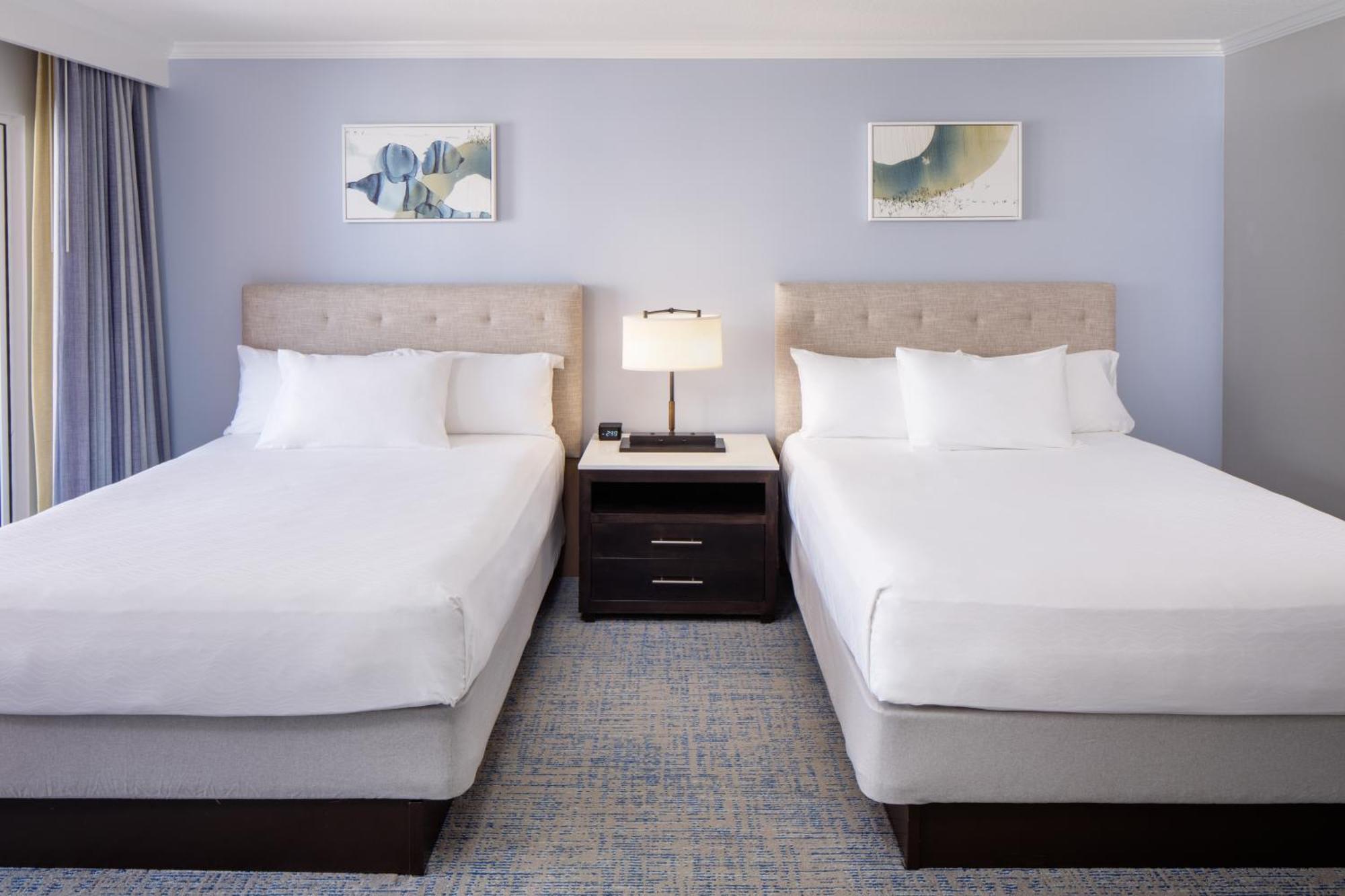 Deluxe Queen Room Two Queen Beds Kitchenette Partial Ocean View,1694539019:JPEG