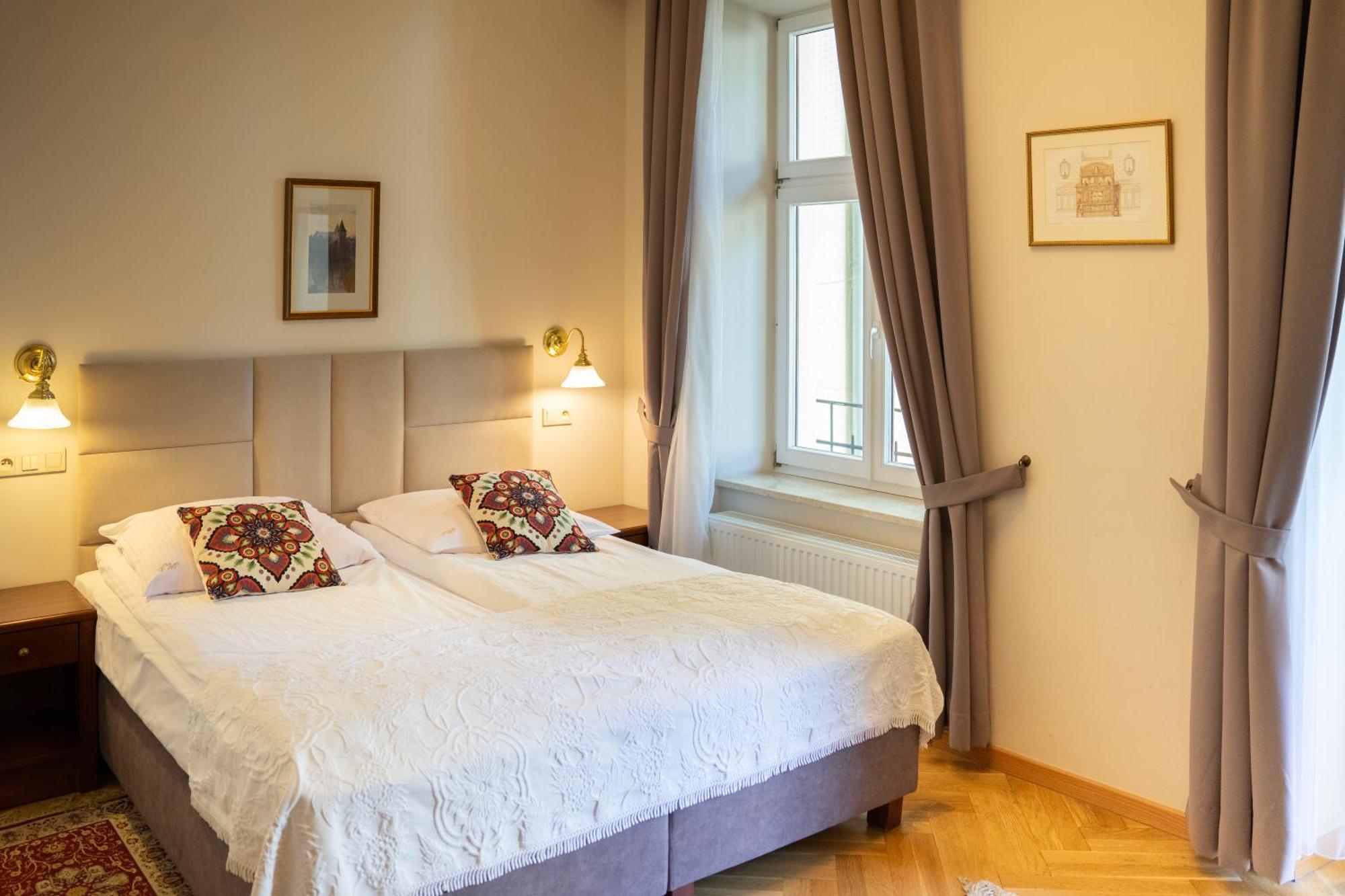Tweepersoonskamer met 2 Aparte Bedden
