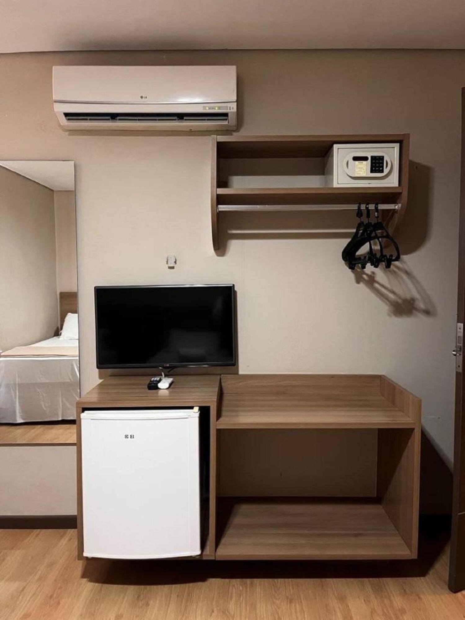 Quarto Triplo Executivo