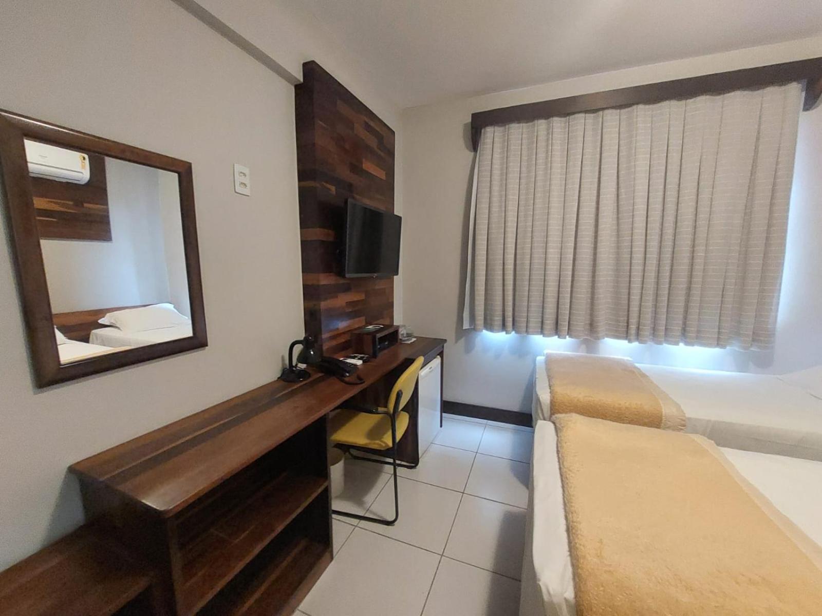 Quarto Triplo Executivo