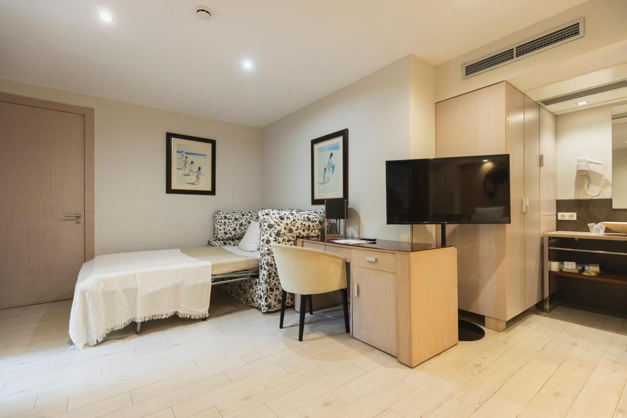 Habitación Doble con cama supletoria (3 adultos)