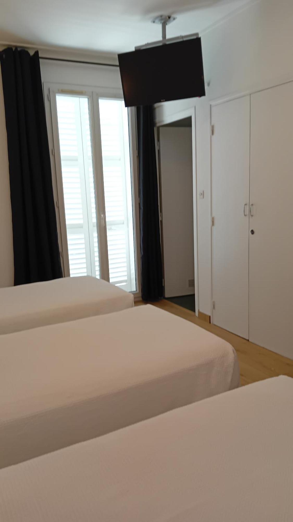 Chambre Triple - Vue sur Ville