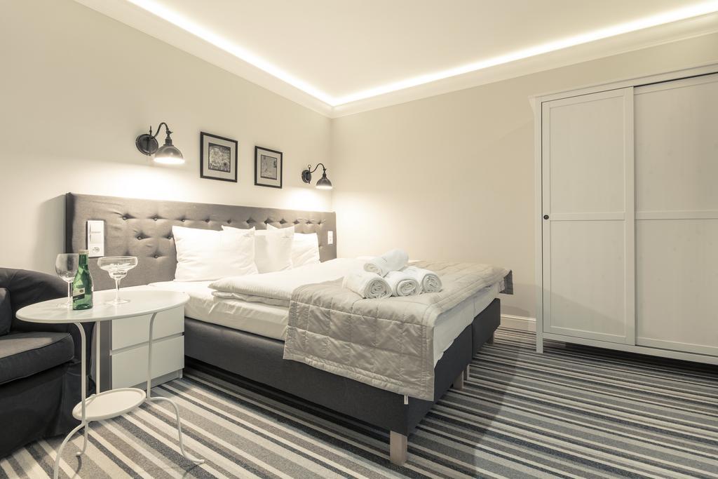 Dreibettzimmer mit Balkon