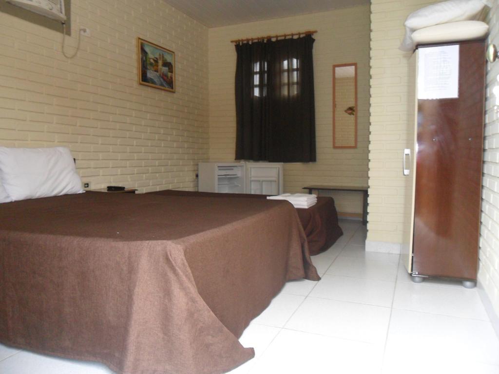 Quarto Triplo com Varanda