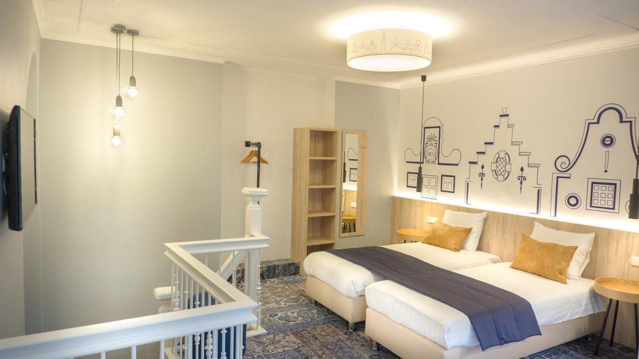 Chambre Quadruple Deluxe - Vue sur Canal