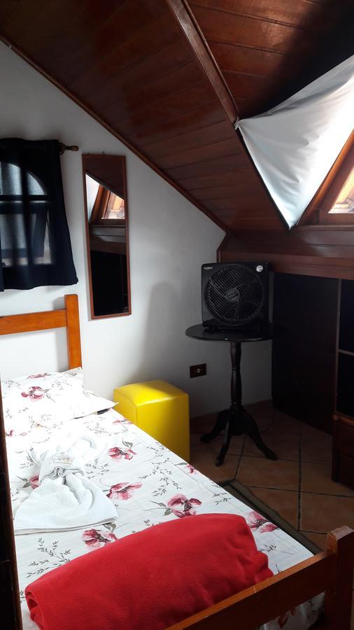 Quarto Individual com Banheiro Compartilhado