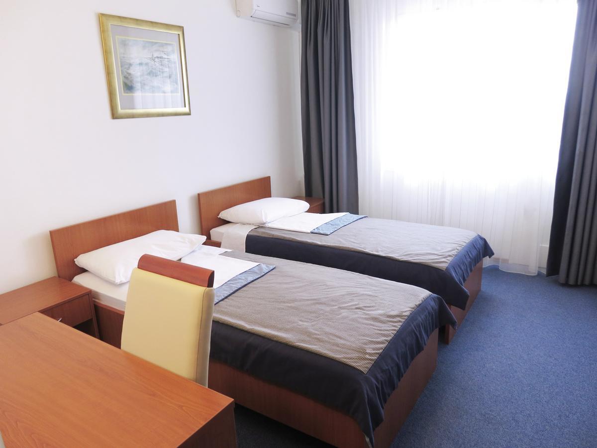 Standaard Tweepersoonskamer met 1 of 2 Bedden, Balkon en Uitzicht op de Stad