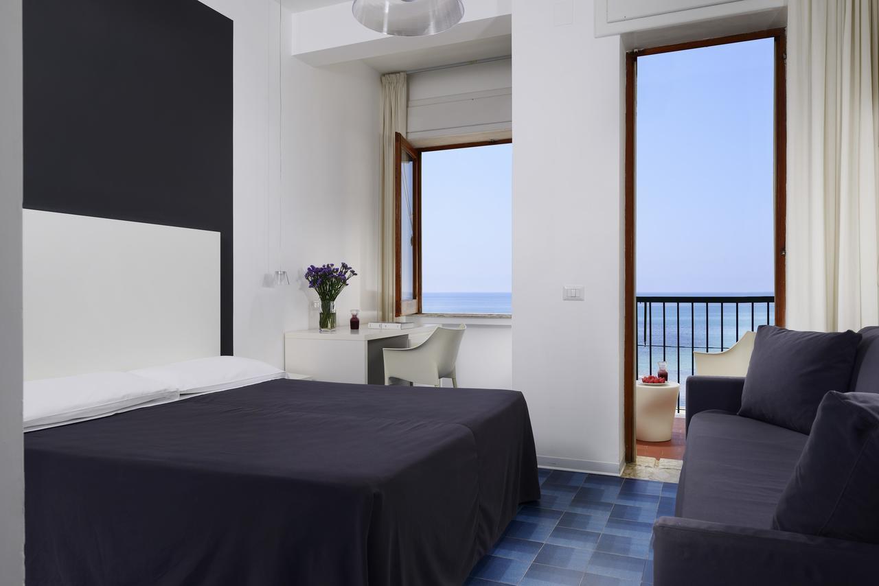 Standard Triple Room with Sea View,696811482:JPEG