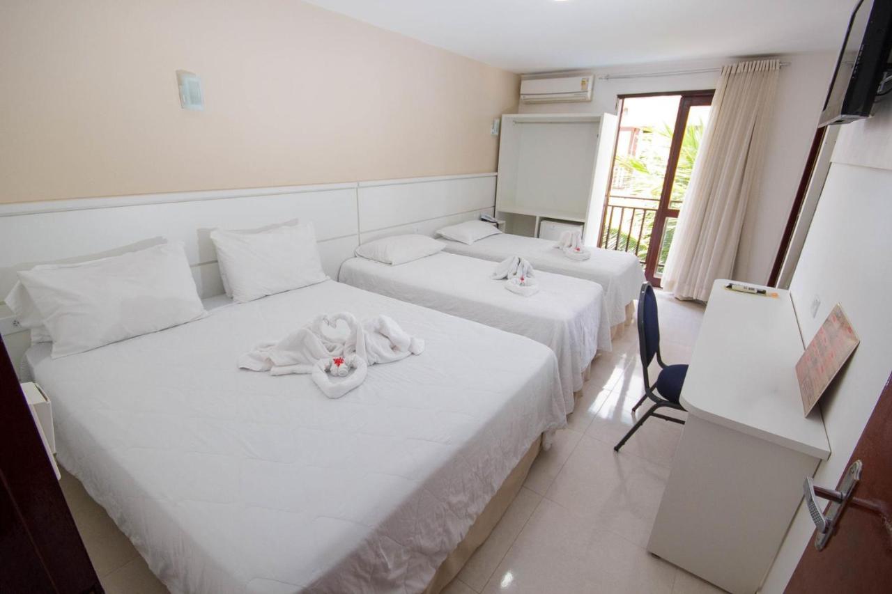 Quarto Quádruplo com Vista Parcial para o Mar