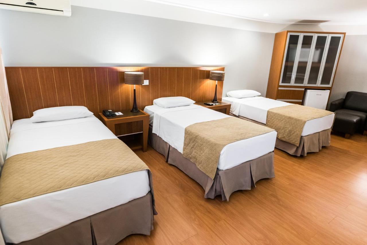 Quarto Triplo Executivo