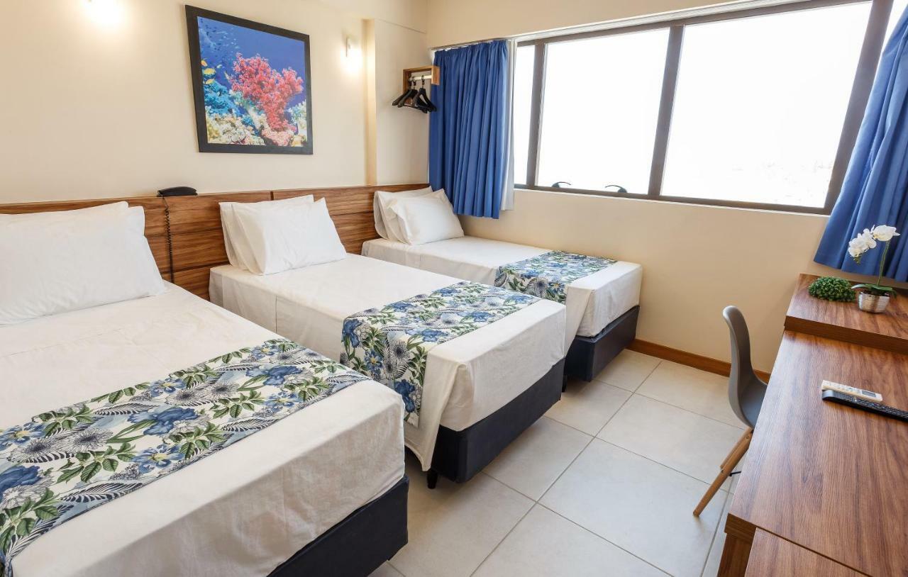 Quarto Triplo com 3 Camas de Solteiro