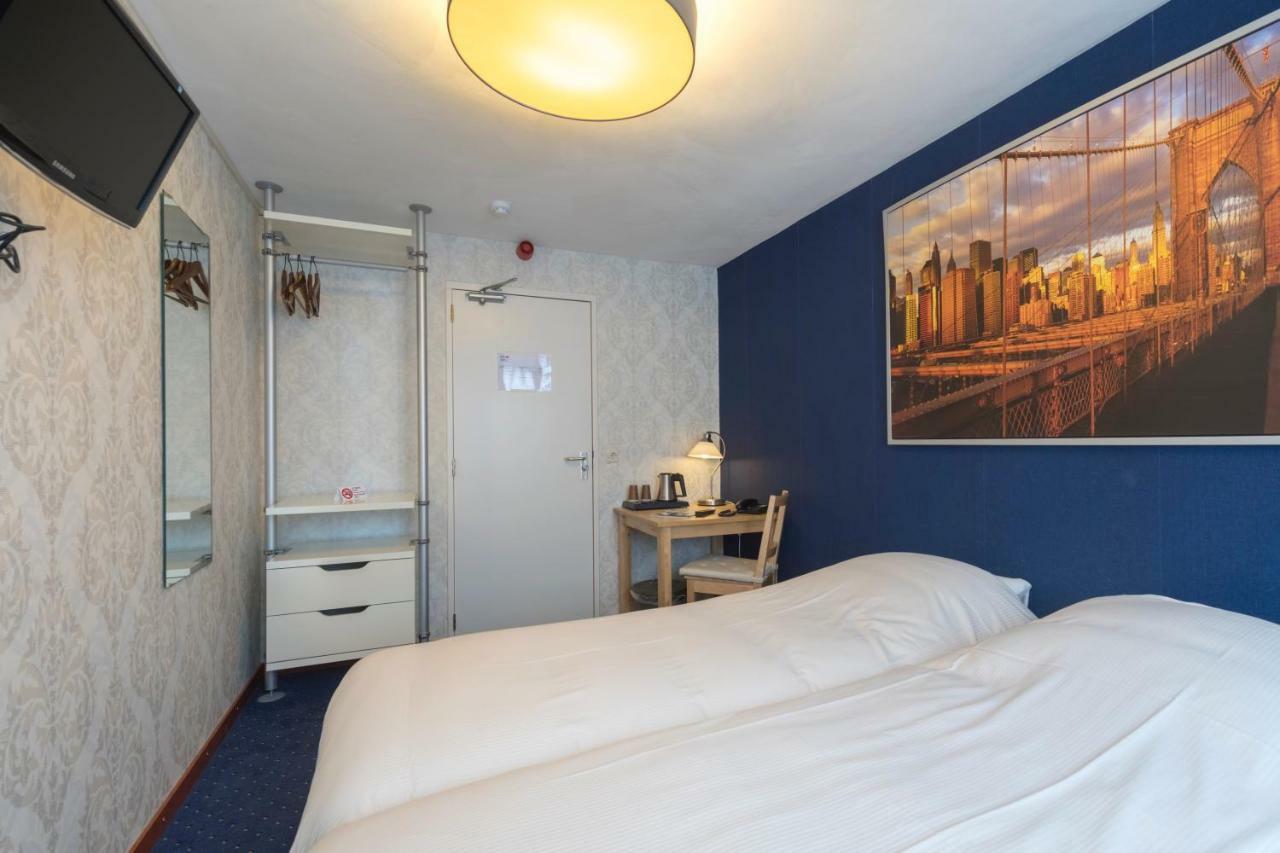 Kleine Tweepersoonskamer met 2 Aparte Bedden